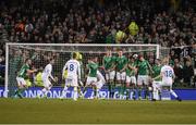 28 March 2017; Hordur Bjorgvin Magnusson of Iceland shoots to score his side's first goal during the International Friendly match between the Republic of Ireland and Iceland at the Aviva Stadium in Dublin. Photo by David Maher/Sportsfile