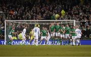 28 March 2017; Hordur Bjorgvin Magnusson of Iceland shoots to score his side's first goal during the International Friendly match between the Republic of Ireland and Iceland at the Aviva Stadium in Dublin. Photo by David Maher/Sportsfile