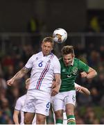 28 March 2017; Ragnar Sigurdsson of Iceland in action against Kevin Doyle of Republic of Ireland during the International Friendly match between the Republic of Ireland and Iceland at the Aviva Stadium in Dublin. Photo by Matt Browne/Sportsfile