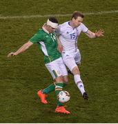 28 March 2017; John Egan of Republic of Ireland in action against Jon Dadi Bodvarsson of Iceland during the International Friendly match between the Republic of Ireland and Iceland at the Aviva Stadium in Dublin. Photo by Eóin Noonan/Sportsfile
