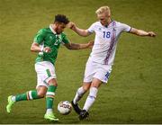 28 March 2017; Cyrus Christie of Republic of Ireland in action against Hordur Bjorgvin Magnusson of Iceland during the International Friendly match between the Republic of Ireland and Iceland at the Aviva Stadium in Dublin. Photo by Ramsey Cardy/Sportsfile