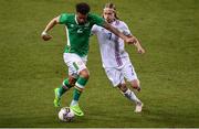 28 March 2017; Cyrus Christie of Republic of Ireland of Iceland in action against Elias mar Omarsson of Iceland during the International Friendly match between the Republic of Ireland and Iceland at the Aviva Stadium in Dublin.  Photo by Ramsey Cardy/Sportsfile