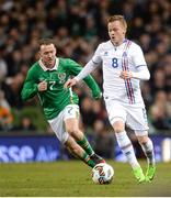 28 March 2017; Aron Sigurdarson of Iceland in action against Aiden McGeady of Republic of Ireland during the International Friendly match between the Republic of Ireland and Iceland at the Aviva Stadium in Dublin. Photo by Cody Glenn/Sportsfile