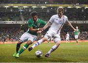 28 March 2017; Jon Dadi Bodvarsson of Iceland in action against Cyrus Christie of Republic of Ireland during the International Friendly match between the Republic of Ireland and Iceland at the Aviva Stadium in Dublin. Photo by Cody Glenn/Sportsfile
