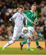 28 March 2017; Aron Sigurdarson of Iceland in action against Aiden McGeady of Republic of Ireland during the International Friendly match between the Republic of Ireland and Iceland at the Aviva Stadium in Dublin. Photo by Cody Glenn/Sportsfile