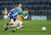29 March 2017; P.J Daly of Offaly in action against Aaron Byrne of Dublin during the EirGrid Leinster GAA Football U21 Championship Final match between Dublin and Offaly at O'Moore Park in Portlaoise, Co Laois. Photo by David Maher/Sportsfile