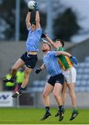 29 March 2017; Brian Howard of Dublin wins the throw-in ahead of team-mate Andrew Foley, centre, and James Lalor of Offaly during the EirGrid Leinster GAA Football U21 Championship Final match between Dublin and Offaly at O'Moore Park in Portlaoise, Co Laois. Photo by Piaras Ó Mídheach/Sportsfile