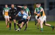 29 March 2017; Chris Sallier of Dublin in action against Clint Horan and Patrick Dunican of Offaly during the EirGrid Leinster GAA Football U21 Championship Final match between Dublin and Offaly at O'Moore Park in Portlaoise, Co Laois. Photo by David Maher/Sportsfile