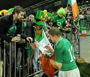 11 September 2011; Ireland captain Brian O'Driscoll signs autographs for Irish supporters after the game. 2011 Rugby World Cup, Pool C, Ireland v USA, Stadium Taranaki, New Plymouth, New Zealand. Picture credit: Brendan Moran / SPORTSFILE