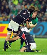 11 September 2011; Geordan Murphy, Ireland, is tackled by Todd Clever, left, and Phil Thiel, USA. 2011 Rugby World Cup, Pool C, Ireland v USA, Stadium Taranaki, New Plymouth, New Zealand. Picture credit: Brendan Moran / SPORTSFILE