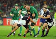 11 September 2011; Paul O'Connell, Ireland, loses possession in a tackle by Andrew Suniula, USA. 2011 Rugby World Cup, Pool C, Ireland v USA, Stadium Taranaki, New Plymouth, New Zealand. Picture credit: Brendan Moran / SPORTSFILE