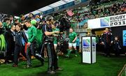 11 September 2011; Ireland captain Brian O'Driscoll leads his side out past the William Webb Ellis trophy before the game. 2011 Rugby World Cup, Pool C, Ireland v USA, Stadium Taranaki, New Plymouth, New Zealand. Picture credit: Brendan Moran / SPORTSFILE