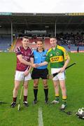 10 September 2011; The Westmeath captain, Alan McGrath, left, and the Kerry captain, Jason Bowler, shake hands accross referee Colm Lyons before the game. Bord Gais Energy GAA Hurling Under 21 All-Ireland 'B' Championship Final, Kerry v Westmeath, Semple Stadium, Thurles, Co. Tipperary. Picture credit: Ray McManus / SPORTSFILE