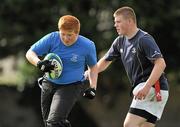 11 September 2011; Adam Kavanagh, left, in action against David Rohan, right, during the Leinster Rugby Club Open Day. St. Mary's RFC, Templeville Road, Co. Dublin. Picture credit: Barry Cregg / SPORTSFILE