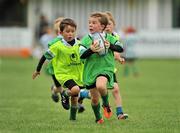 11 September 2011; Paul O'Dwyer, age 7, makes a break from the pack during the Leinster Rugby Club Open Day. Naas RFC, Co. Kildare. Picture credit: Barry Cregg / SPORTSFILE