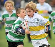 11 September 2011; Pierce Mooney, age 8, makes a break from James Whitaker, left, age 7, both from Naas, Co. Kildare, during the Leinster Rugby Club Open Day. Naas RFC, Co. Kildare. Picture credit: Barry Cregg / SPORTSFILE