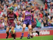 11 September 2011; Ursula Jacob, Wexford, celebrates scoring her side's second goal, as Heather Cooney, Galway, looks on. All-Ireland Senior Camogie Championship Final in association with RTE Sport, Galway v Wexford, Croke Park, Dublin. Picture credit: Brian Lawless / SPORTSFILE