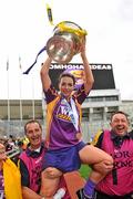 11 September 2011; Wexford captain Ursula Jacob is lifted shoulder high with the O'Duffy cup after the game. All-Ireland Senior Camogie Championship Final in association with RTE Sport, Galway v Wexford, Croke Park, Dublin. Picture credit: David Maher / SPORTSFILE