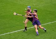 11 September 2011; Ursula Jacob, Wexford, in action against Therese Manton, Galway. All-Ireland Senior Camogie Championship Final in association with RTE Sport, Galway v Wexford, Croke Park, Dublin. Picture credit: Pat Murphy / SPORTSFILE