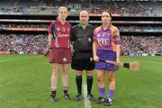 11 September 2011; Referee Mike O'Kelly with captains, Ursula Jacob, right, Wexford, and Brenda Hanney, Galway. All-Ireland Senior Camogie Championship Final in association with RTE Sport, Galway v Wexford, Croke Park, Dublin. Picture credit: David Maher / SPORTSFILE