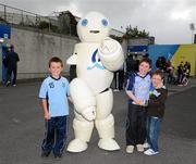 10 September 2011; Dublin supporters, left to right, Luke O'Sullivan, aged 8, Ciarán McDermott, aged 8, and Cormac McDermott, aged 6, from Rathcoole, Co. Dublin, with the Bord Gais Energy Bot mascot. Semple Stadium, Thurles, Co. Tipperary. Picture credit: Dáire Brennan / SPORTSFILE