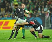 11 September 2011; Geordan Murphy, Ireland, is tackled by Todd Clever and Phil Thiel, USA. 2011 Rugby World Cup, Pool C, Ireland v USA, Stadium Taranaki, New Plymouth, New Zealand. Picture credit: Brendan Moran / SPORTSFILE
