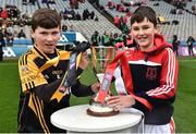 17 March 2017; Cody Killoughery, left, of Ballyea National School, Co. Clare, and Shane Dunne, Our Lady of Good Counsel National School, Dublin, carry out the Tommy Moore Cup ahead of the AIB GAA Hurling All-Ireland Senior Club Championship Final match between Ballyea and Cuala at Croke Park in Dublin. Photo by Brendan Moran/Sportsfile