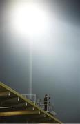 25 March 2017; A single cameraman records the match from the roof of the stand under the floodlights during the Allianz Football League Division 3 Round 6 game between Armagh and Antrim at Athletic Grounds in Armagh. Photo by Oliver McVeigh/Sportsfile