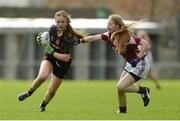 31 March 2017; Sinéad McElligott of John the Baptist Community School in action against Áine Dennehy of Loreto College during the Lidl All Ireland PPS Junior A Championship final match between Loreto College and John the Baptist Community School at St Brendan's Park in Birr, Co Offaly. Photo by Piaras Ó Mídheach/Sportsfile
