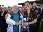 31 March 2017; John the Baptist Community School captain Anna-Rose Kennedy is presented with the cup by Geraldine Carey, LGFA, after the Lidl All Ireland PPS Junior A Championship final match between Loreto College and John the Baptist Community School at St Brendan's Park in Birr, Co Offaly. Photo by Piaras Ó Mídheach/Sportsfile