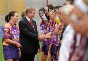 11 September 2011; An Taoiseach Enda Kenny T.D. is introduced to the Wexford players by Wexford captain Ursula Jacob before the game. All-Ireland Senior Camogie Championship Final in association with RTE Sport, Galway v Wexford, Croke Park, Dublin. Picture credit: Brian Lawless / SPORTSFILE