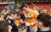 1 April 2017; Simon McCrory of Antrim signs autographs for young supporters after the Allianz Hurling League Division 2A Final match between Antrim and Carlow at Páirc Esler, in Newry. Photo by Oliver McVeigh/Sportsfile