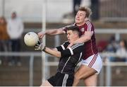 1 April 2017; Kyle Cawley of Sligo in action against Liam Kelly of Galway during the EirGrid Connacht GAA Football U21 Championship Final match between Galway and Sligo at Markievicz Park in Sligo. Photo by David Fitzgerald/Sportsfile