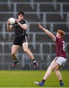 1 April 2017; Darragh Cummins  of Sligo takes a high ball ahead of Peter Cooke of Galway during the EirGrid Connacht GAA Football U21 Championship Final match between Galway and Sligo at Markievicz Park in Sligo. Photo by David Fitzgerald/Sportsfile