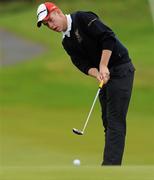 14 September 2011; David Fox, Co. Meath Golf Club, Co. Meath, putting during the Junior Cup Semi-Final against Lurgan Golf Club, Co. Armagh. Chartis Insurance Ireland Cups and Shields Finals 2011, Castlerock Golf Club, Co. Derry. Picture credit: Oliver McVeigh/ SPORTSFILE