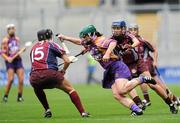 11 September 2011; Noeleen Lambert, Wexford, in action against Veronica Curtin, left, and Niamh Kilkenny, Galway. All-Ireland Senior Camogie Championship Final in association with RTE Sport, Galway v Wexford, Croke Park, Dublin. Picture credit: Brian Lawless / SPORTSFILE