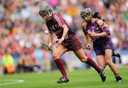 11 September 2011; Veronica Curtin, Galway, in action against Claire O'Connor, Wexford. All-Ireland Senior Camogie Championship Final in association with RTE Sport, Galway v Wexford, Croke Park, Dublin. Picture credit: Brian Lawless / SPORTSFILE