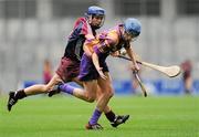 11 September 2011; Josie Dwyer, Wexford, in action against Niamh Kilkenny, Galway. All-Ireland Senior Camogie Championship Final in association with RTE Sport, Galway v Wexford, Croke Park, Dublin. Picture credit: Brian Lawless / SPORTSFILE