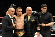 10 September 2011; Carl Frampton with manager Barry McGuigan, trainer Gerry Storey and Shane McGuigan, after his vacant Commonwealth Super Bantamweight bout against Mark Quon. WBA World Light-Welterweight Championship Eliminator, Undercard, Carl Frampton v Mark Quon, Odyssey Arena, Belfast, Co. Antrim. Picture credit: Oliver McVeigh / SPORTSFILE