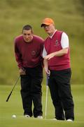 15 September 2011; Andrew Holohan and Garry Beagan, Corrstown Golf Club, Co. Dublin, discussing a putt on the 18th green during the Pierce Purcell Shield Semi-Final against Letterkenny Golf Club, Co. Donegal. Chartis Cups and Shields Finals 2011, Castlerock Golf Club, Co. Derry. Picture credit: Oliver McVeigh/ SPORTSFILE