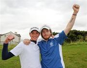 15 September 2011; Stephen Coulter and Ryan Gribben, Warrenpoint Golf Club, Co. Down, celebrate on the 18th green after winning the Barton Shield Final against Tramore Golf Club, Co. Waterford. Chartis Cups and Shields Finals 2011, Castlerock Golf Club, Co. Derry. Picture credit: Oliver McVeigh/ SPORTSFILE