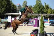 15 September 2011; Shane Sweetnan, from Kanturk, Co. Cork, and Amaretto D'Arco while competing in the second days event at the FEI European Jumping Championships, Club de Campo Villa, Madrid, Spain. Picture credit: Ray McManus / SPORTSFILE