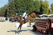 16 September 2011; Shane Sweetnan, from Kanturk, Co. Cork, and Amaretto D'Arco while competing in the third day's event at the FEI European Jumping Championships, Club de Campo Villa, Madrid, Spain. Picture credit: Ray McManus / SPORTSFILE