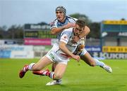 16 September 2011; Craig Gilroy, Ulster, is tackled by Cardiff Blues. Celtic League, Ulster v Cardiff Blues, Ravenhill Park, Belfast, Co. Antrim. Photo by Sportsfile