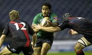 16 September 2011; Henry Fa'afili, Connacht, is tackled by James King, and Grant Gilchrist, right, Edinburgh. Celtic League, Edinburgh v Connacht, Murrayfield Stadium, Edinburgh, Scotland. Picture credit: Ross Brownlee / SPORTSFILE