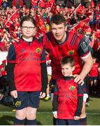 1 April 2017; Peter O'Mahony of Munster with mascots Jessica Lawlor, age 10, from Limerick and Joe McNamara, age 6, from Dublin ahead of the European Rugby Champions Cup Quarter-Final match between Munster and Toulouse at Thomond Park, in Limerick. Photo by Eóin Noonan/Sportsfile
