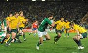 17 September 2011; Ireland's Conor Murray evades the Australia defence on the way to scoring a try, which ws subsequently disallowed. 2011 Rugby World Cup, Pool C, Australia v Ireland, Eden Park, Auckland, New Zealand. Picture credit: Brendan Moran / SPORTSFILE