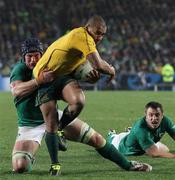 17 September 2011; Ireland's Sean O'Brien tackles Will Genia, Australia. 2011 Rugby World Cup, Pool C, Australia v Ireland, Eden Park, Auckland, New Zealand. Picture credit: David Rowland / SPORTSFILE