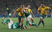 17 September 2011; Ireland's Sean O'Brien tackles Will Genia, Australia. 2011 Rugby World Cup, Pool C, Australia v Ireland, Eden Park, Auckland, New Zealand. Picture credit: David Rowland / SPORTSFILE