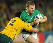 17 September 2011; Gordon D'Arcy, Ireland, is tackled by Stephen Moore, Australia. 2011 Rugby World Cup, Pool C, Australia v Ireland, Eden Park, Auckland, New Zealand. Picture credit: Brendan Moran / SPORTSFILE